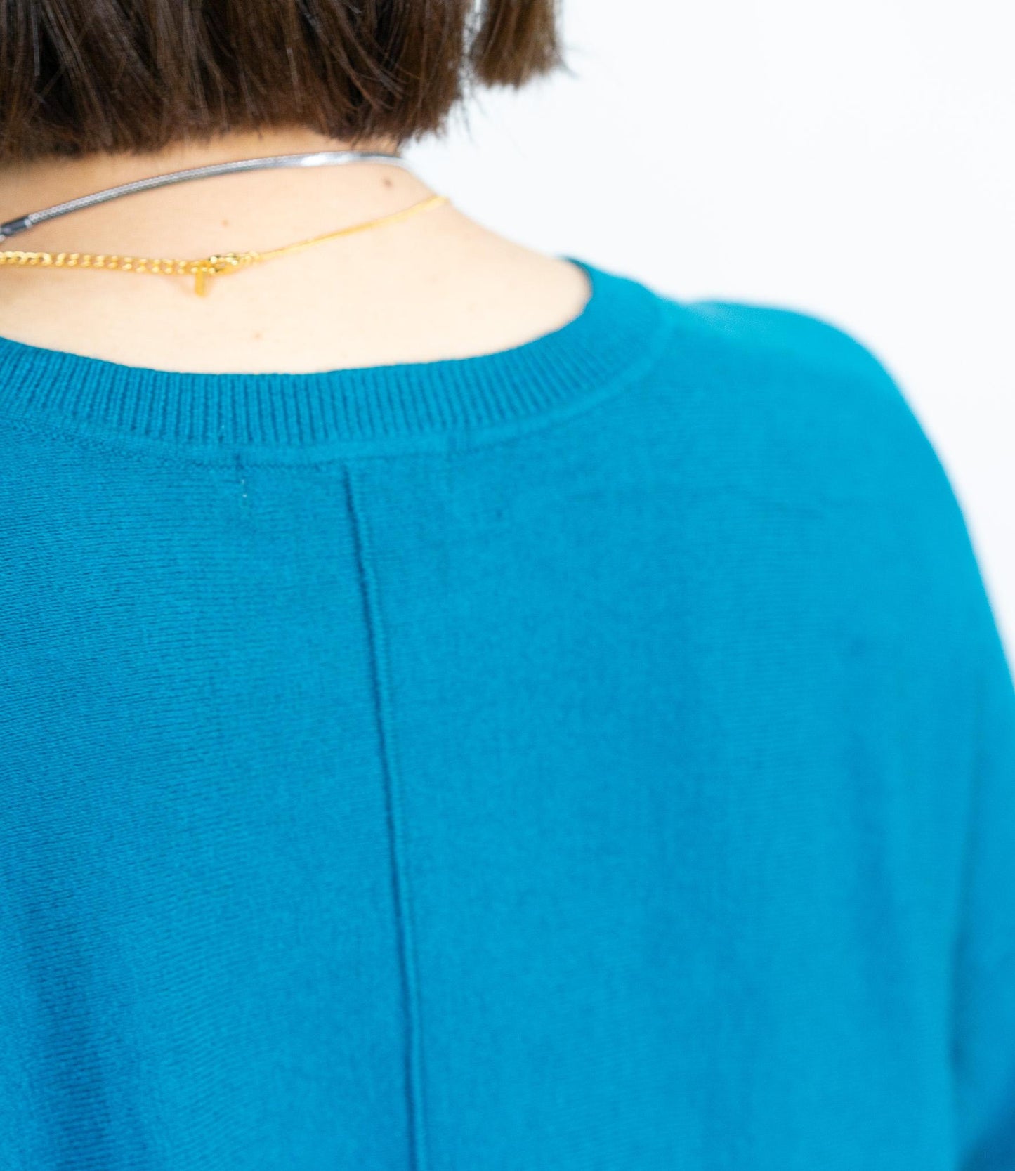 センターラインドレープチュニックニット