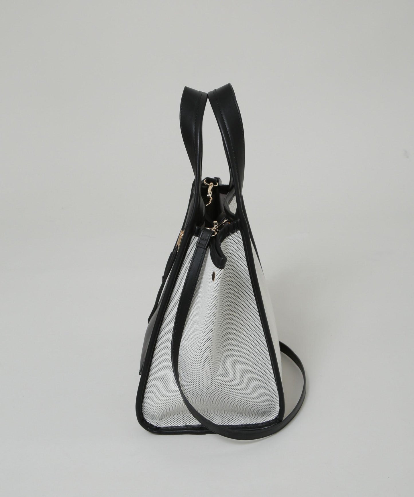 キャンバス×フェイクレザーポケットバッグ