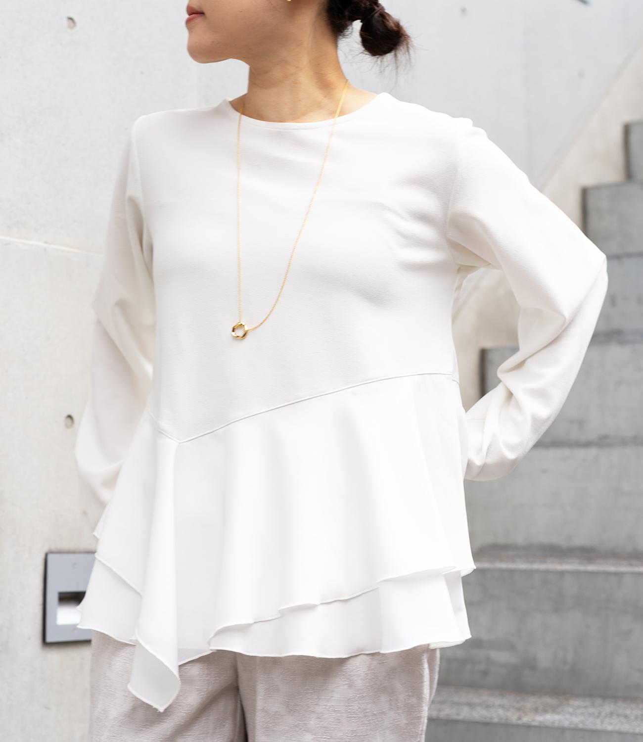 ドッキングイレヘムブラウス