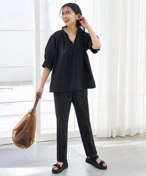 FINE MOVE テーパードパンツ