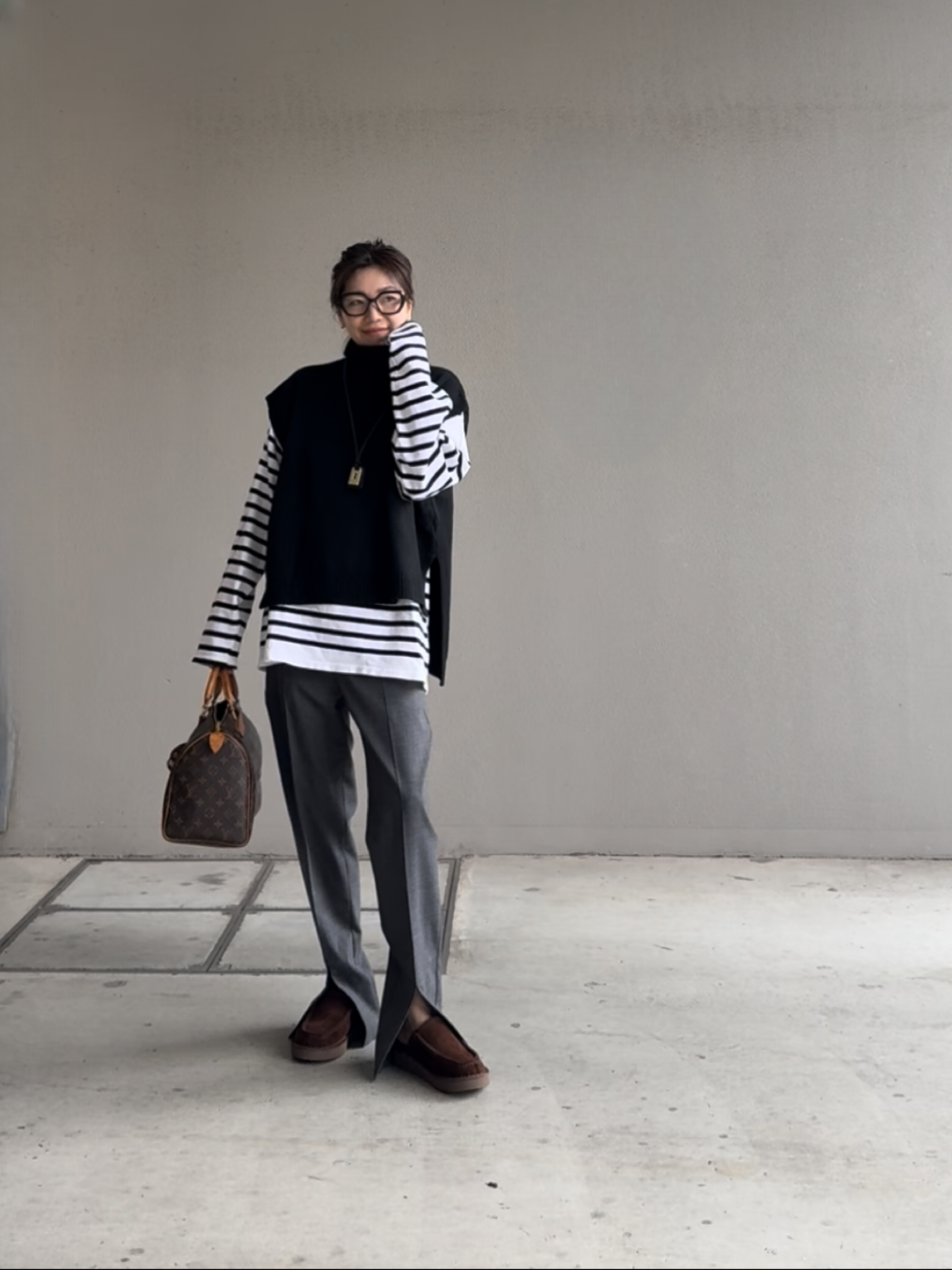 タートルネックスリットベスト