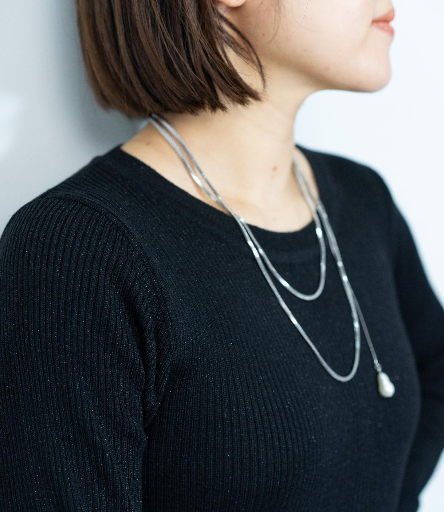 ラメリブクルーネックスリムニット