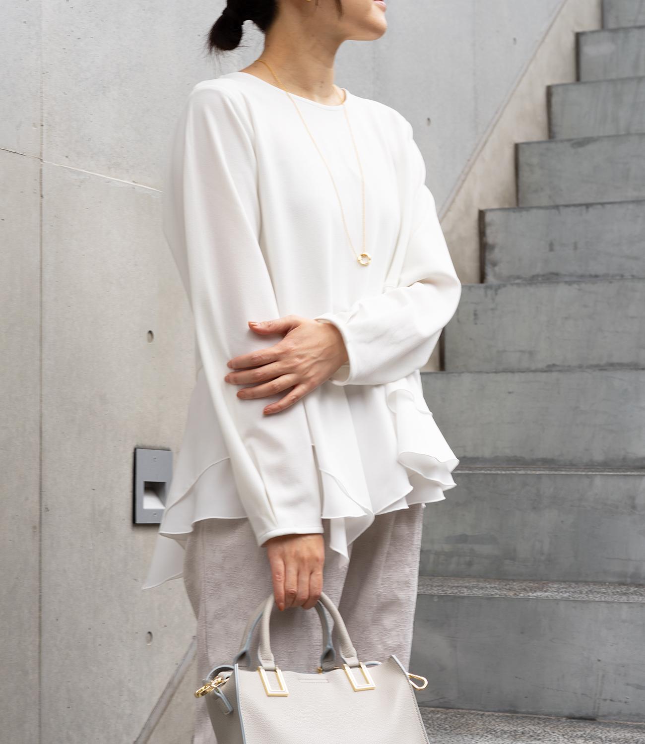 ドッキングイレヘムブラウス