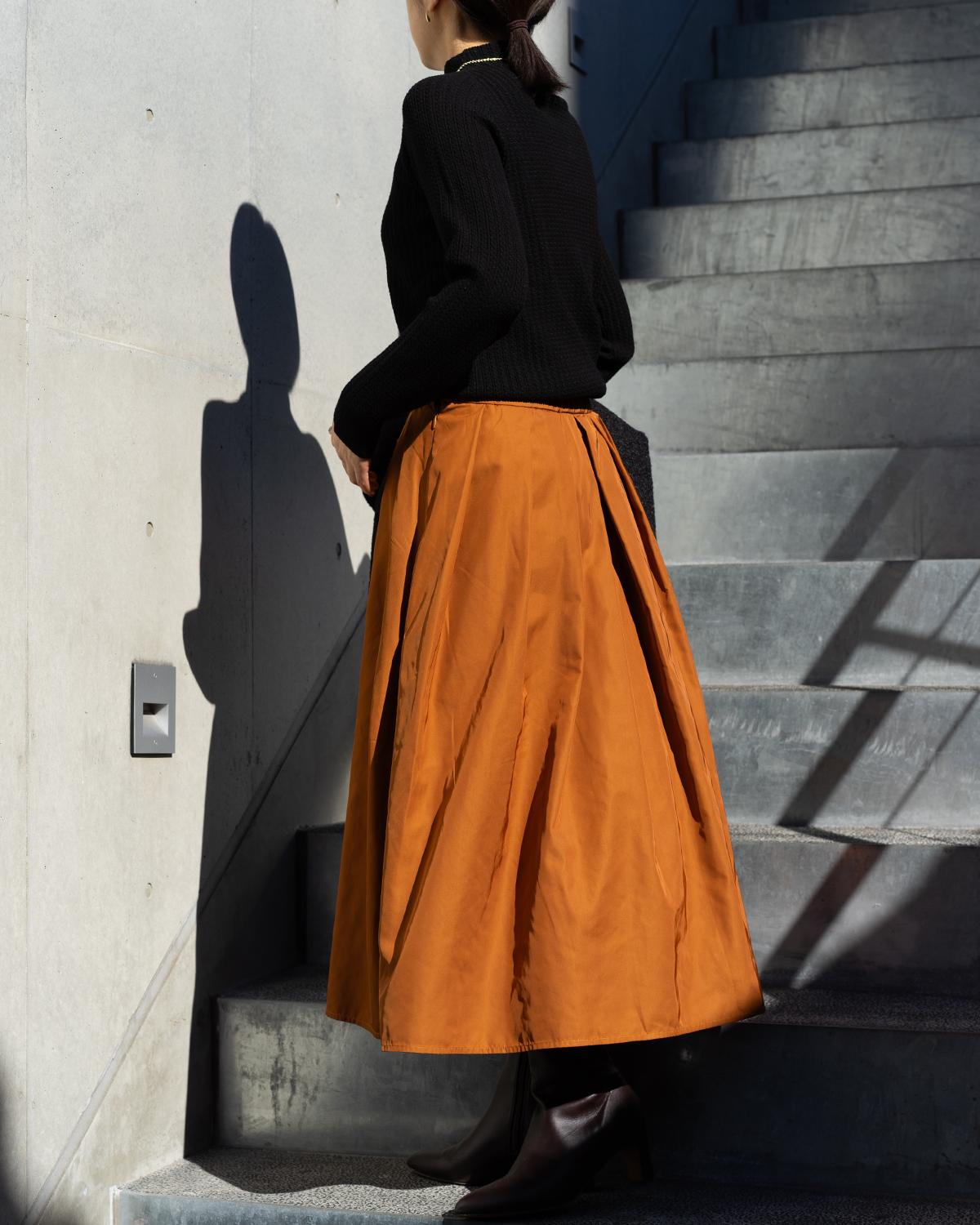 ケーブル柄ボトルネックニット