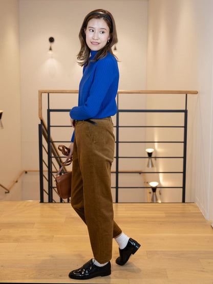 ケーブル柄ボトルネックニット