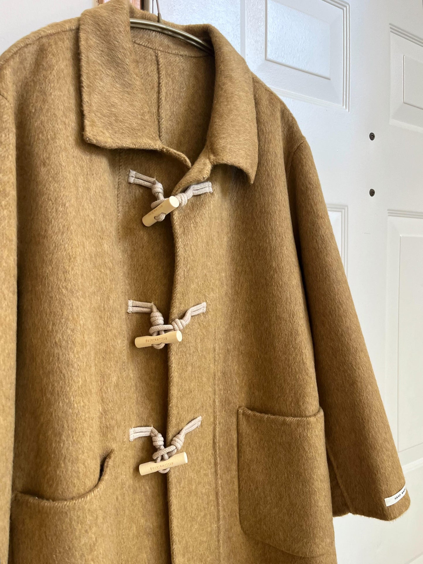 マスタードダッフルコート