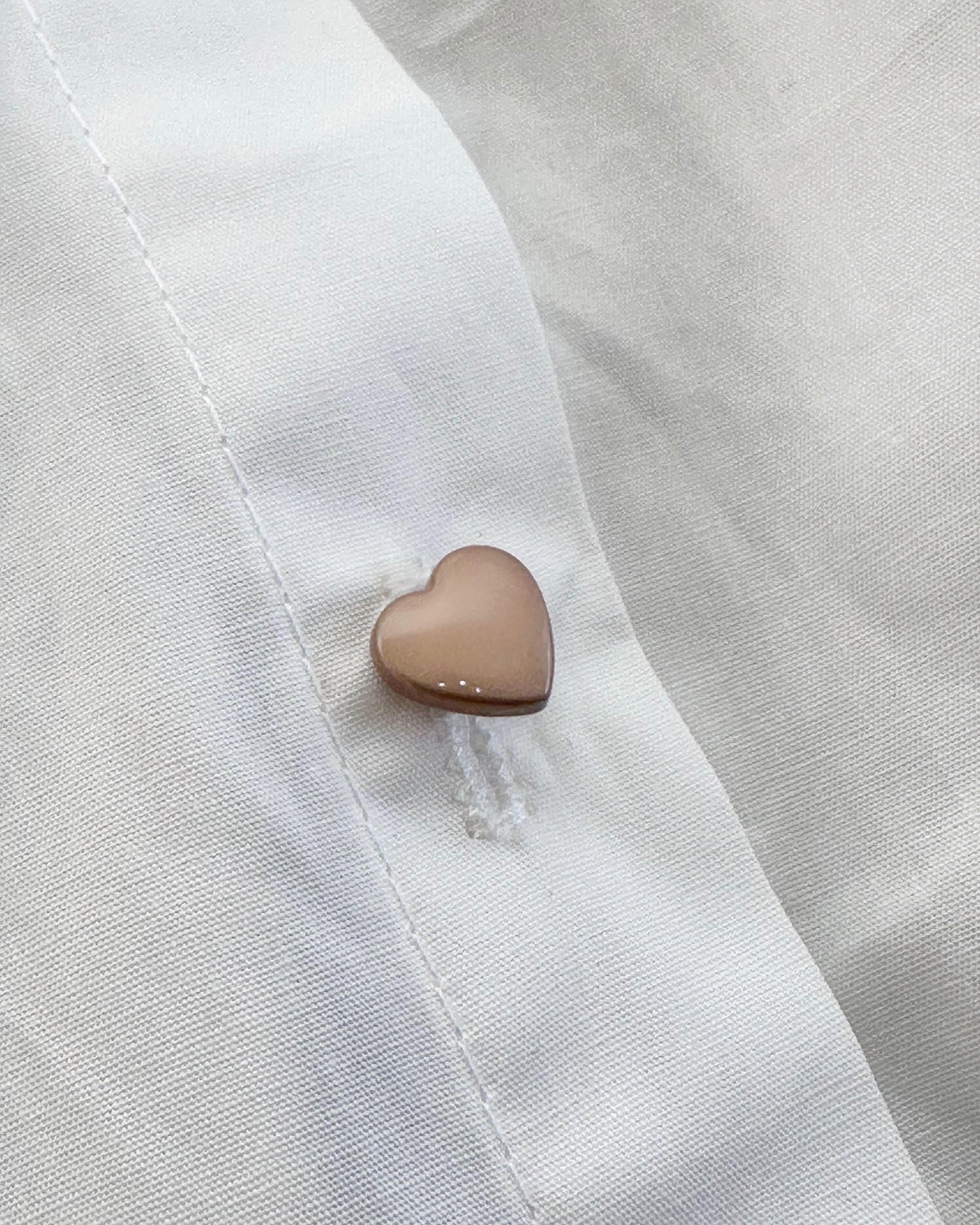 ハートボタンシャツ