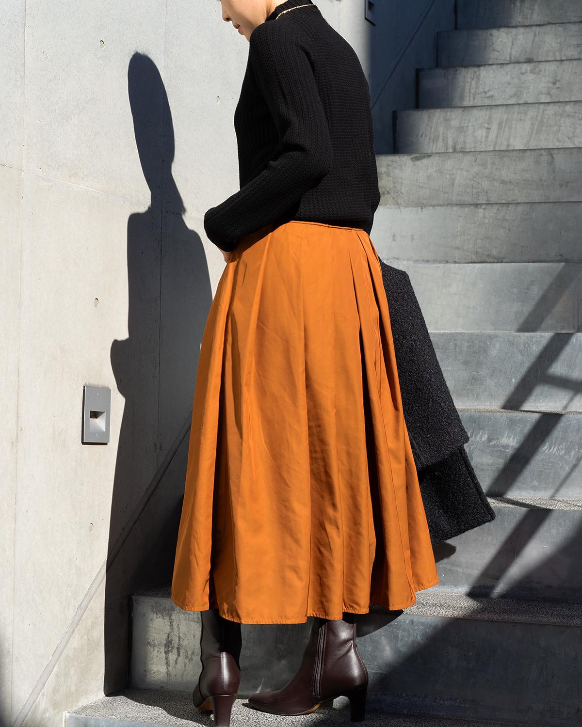 ケーブル柄ボトルネックニット