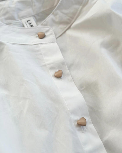 ハートボタンシャツ