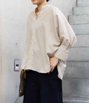 サーキュラーフレアスキッパーブラウス