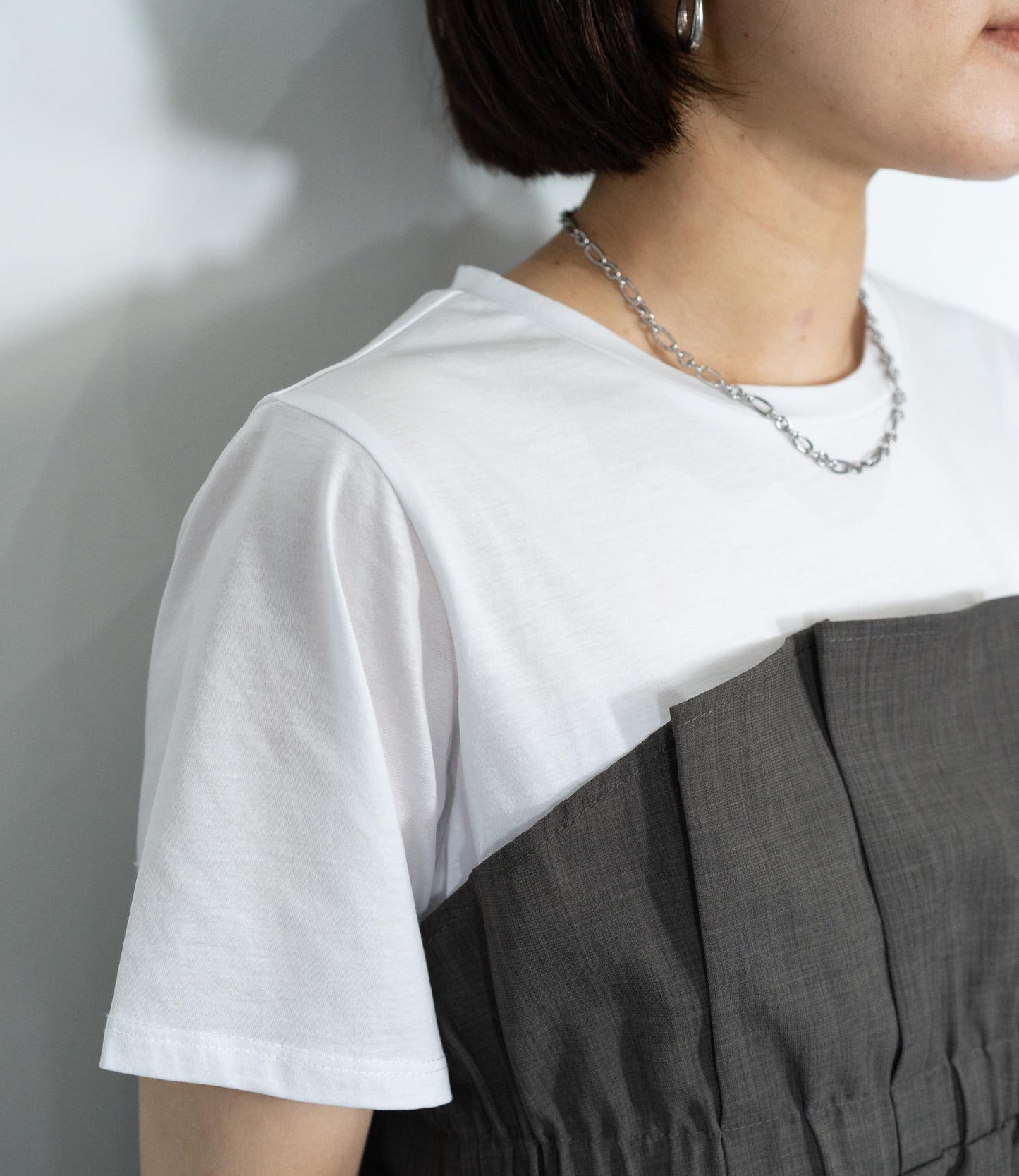 異素材ドッキングペプラムTシャツ