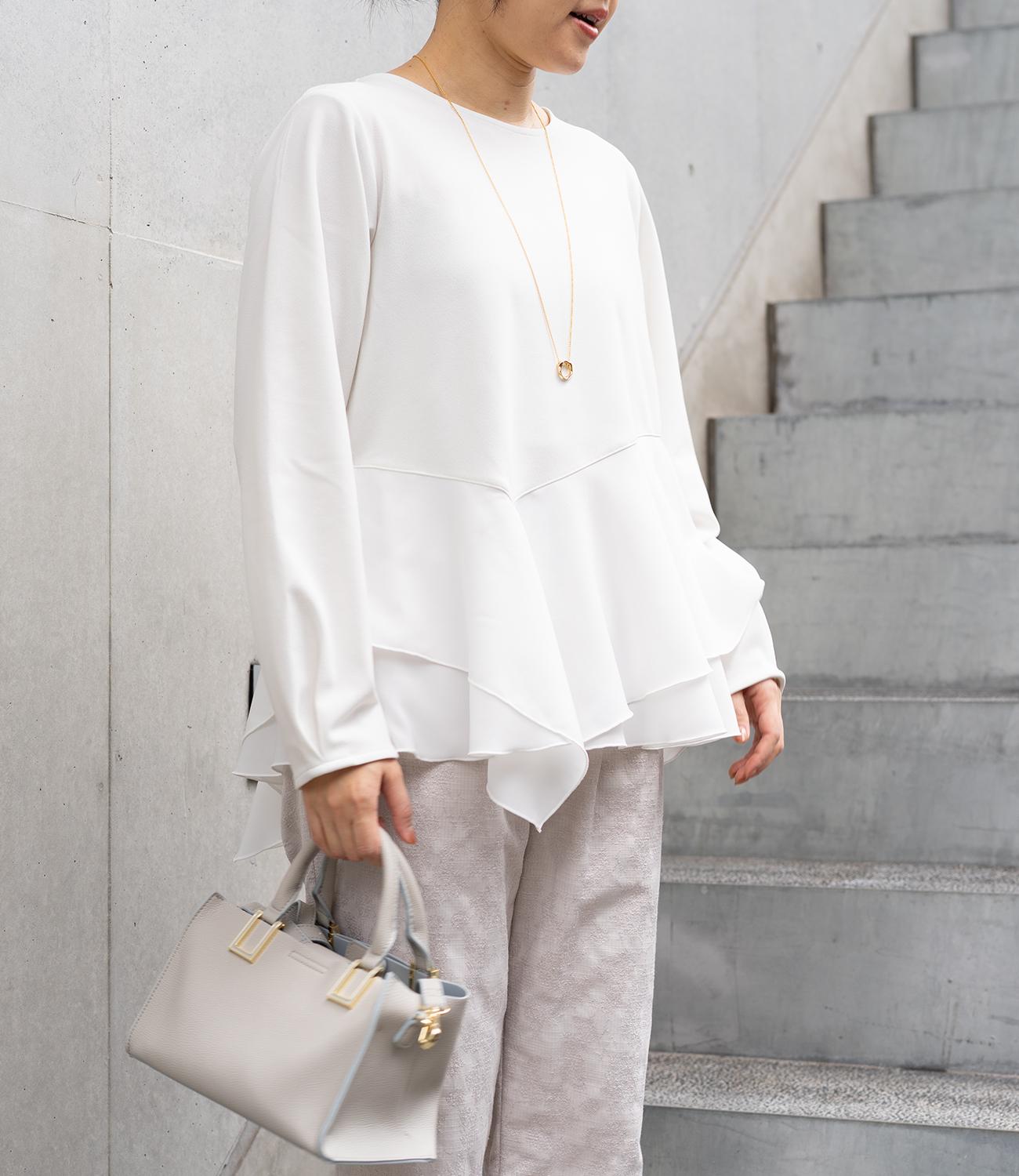 ドッキングイレヘムブラウス