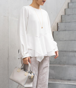 ドッキングイレヘムブラウス