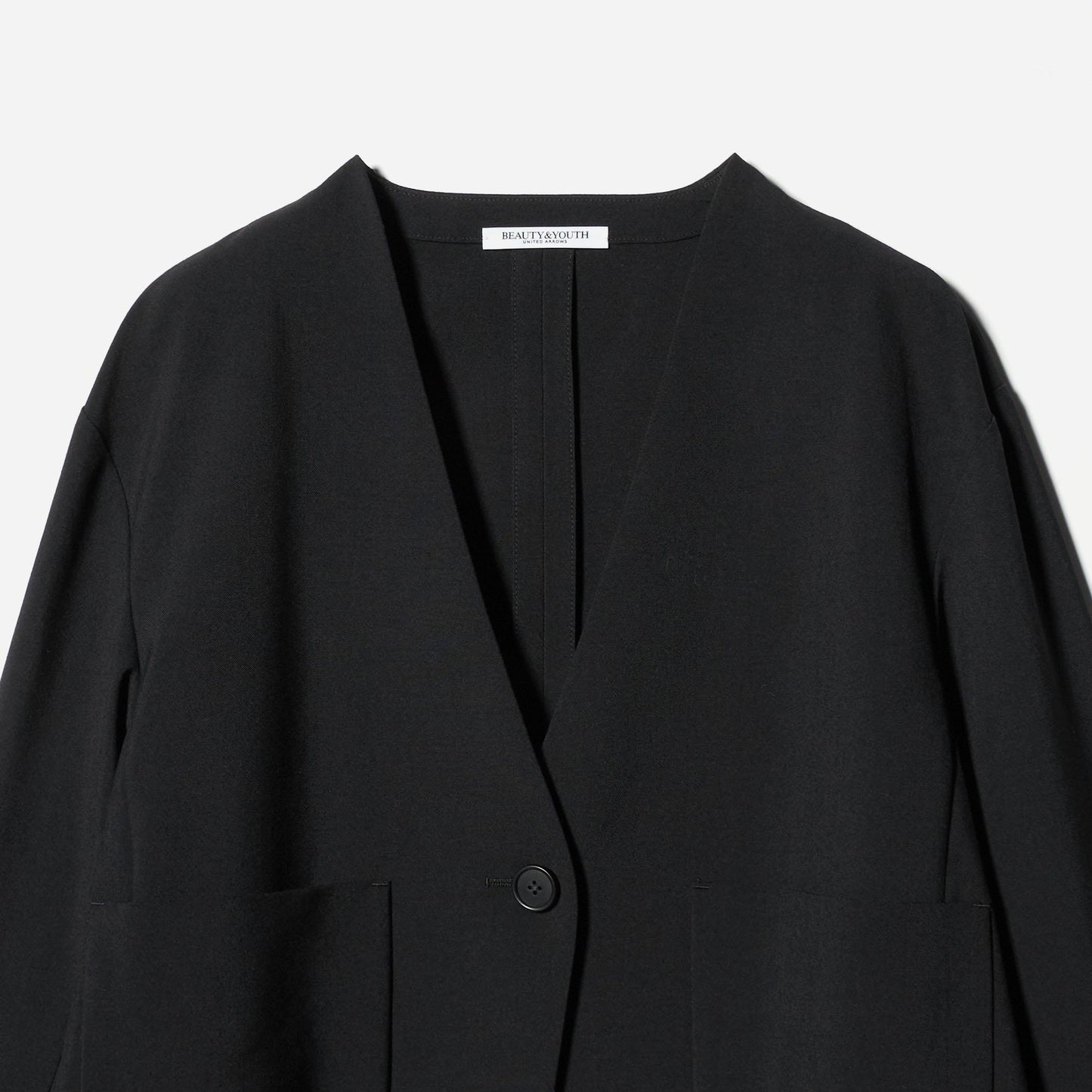 ポリエステルブレンド カラーレス ショートジャケット