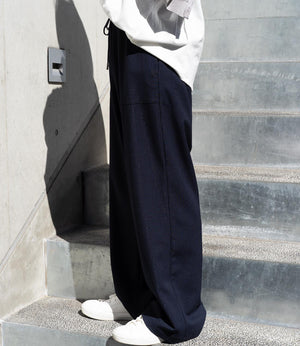 フィルムストライプストレートパンツ