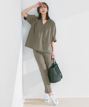 FINE MOVE テーパードパンツ