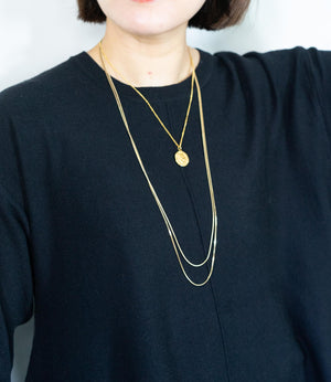 センターラインドレープチュニックニット