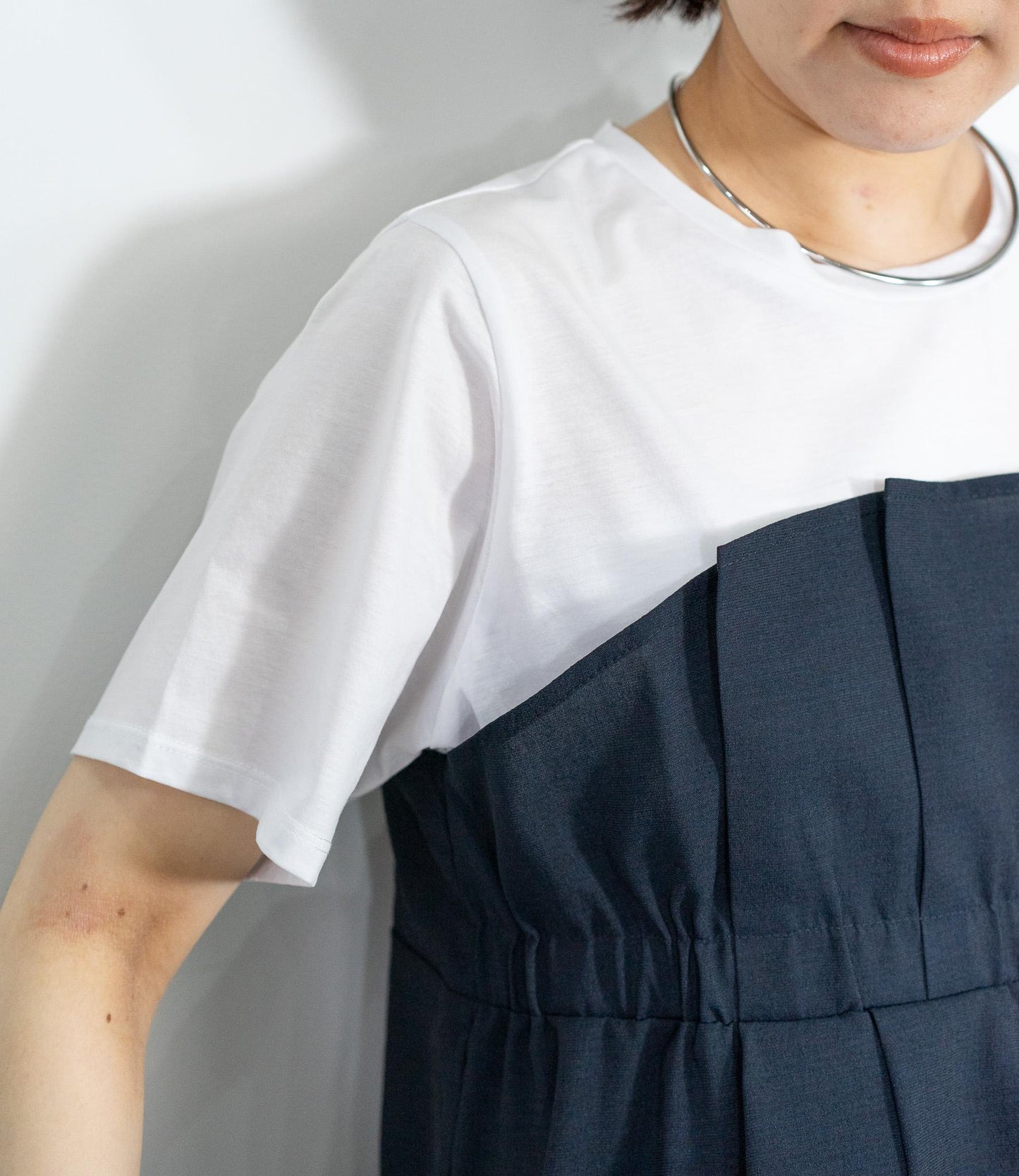 異素材ドッキングペプラムTシャツ