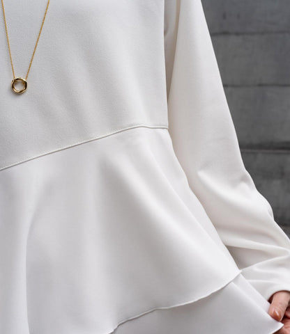 ドッキングイレヘムブラウス