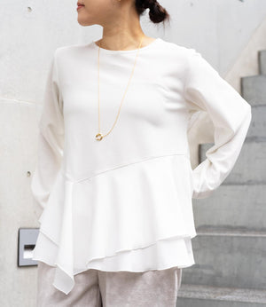 ドッキングイレヘムブラウス