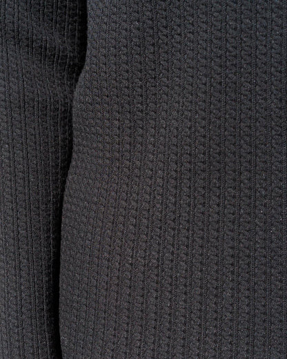 ケーブル柄ボトルネックニット