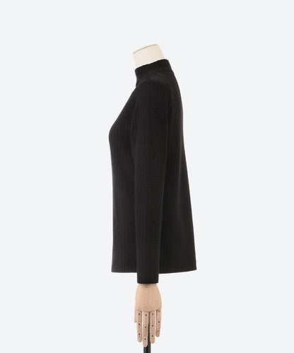 ケーブル柄ボトルネックニット