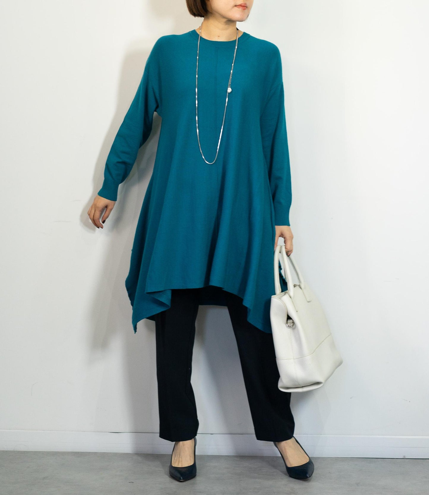 センターラインドレープチュニックニット