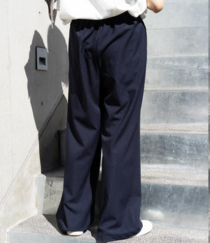 フィルムストライプストレートパンツ