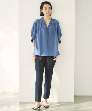 FINE MOVE テーパードパンツ